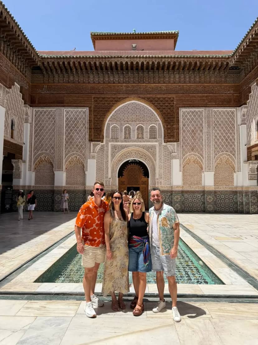 Travellers with their guide in the Ben Youssef Madrasa, Marrakech