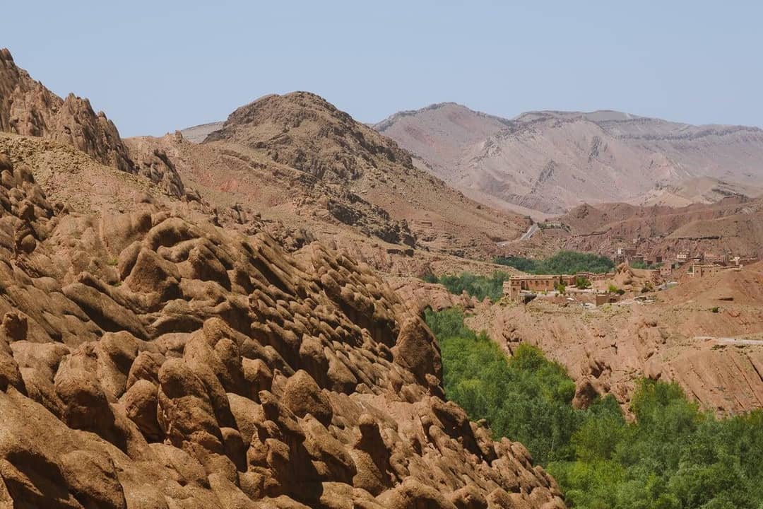 Green oasis and red rock in the valley near Tinghir