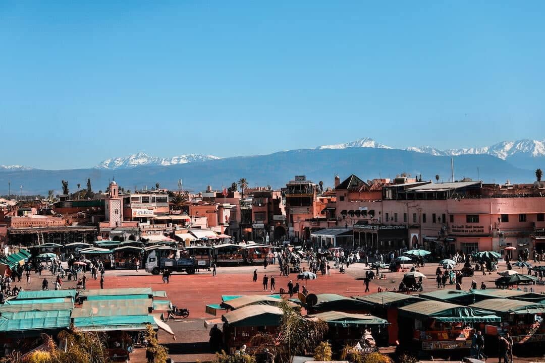 Panoramic view of Marrakech medina and Koutoubia Mosque at sunset