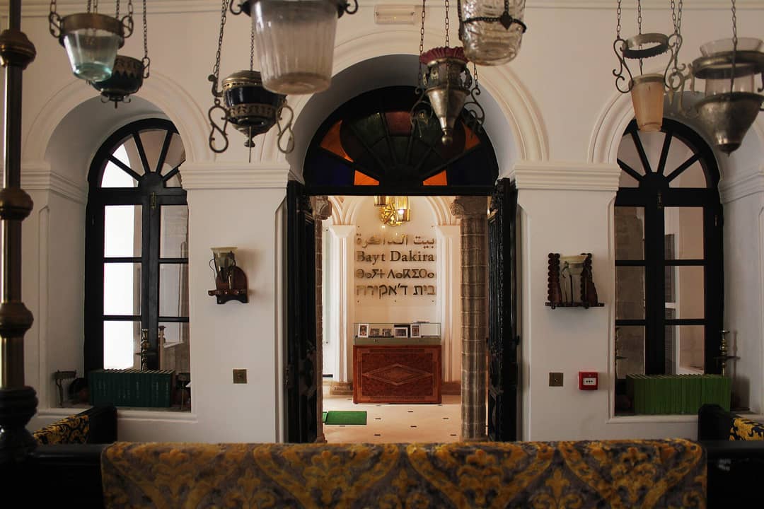 The restored prayer hall of the Simon Attias synagogue inside Bayt Dakira, Essaouira, with its carved wooden Torah ark