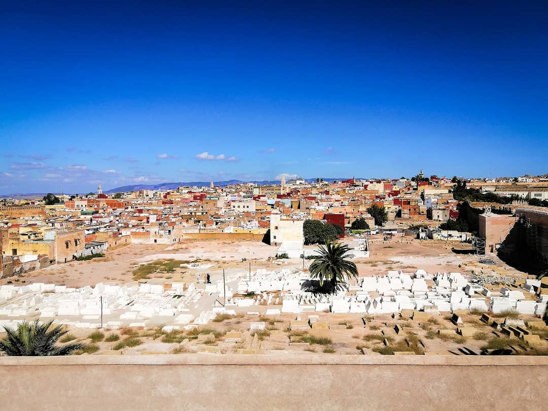 Whitewashed graves and restored tombs in the Jewish cemetery of Meknes