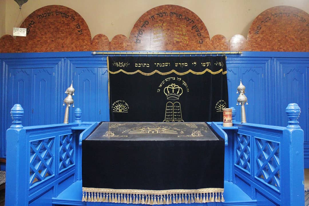 Light-blue Torah ark and bimah in the upstairs prayer hall of the Rabbi Haim Pinto Synagogue, Essaouira
