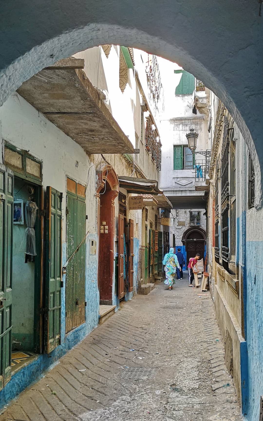 A straight whitewashed lane with arches in the former Jewish quarter (mellah) of Tetouan’s medina