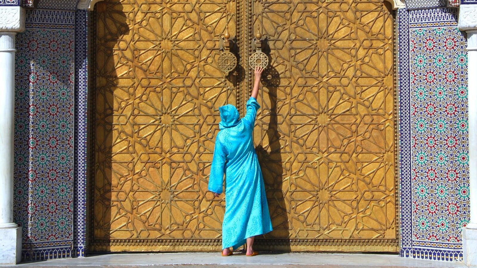 Royal palace gates of Fes with intricate Moroccan tilework