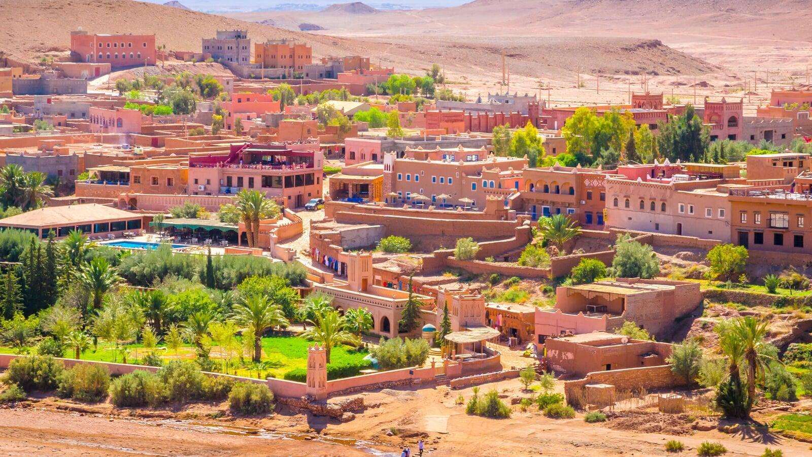 Beautiful village in southern Morocco with traditional houses and mountain views, featured on a guided Morocco tour itinerary.