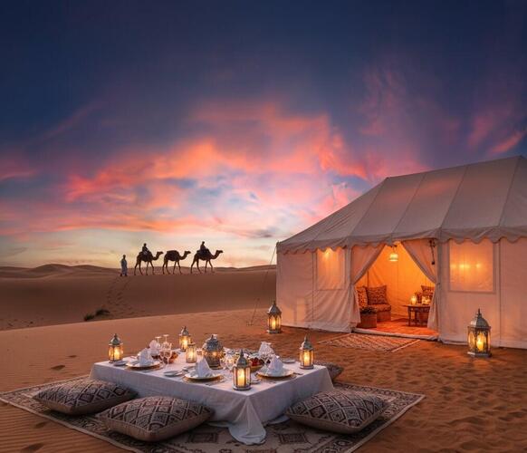 Sunset over the Sahara Desert dunes during a luxury Morocco tour